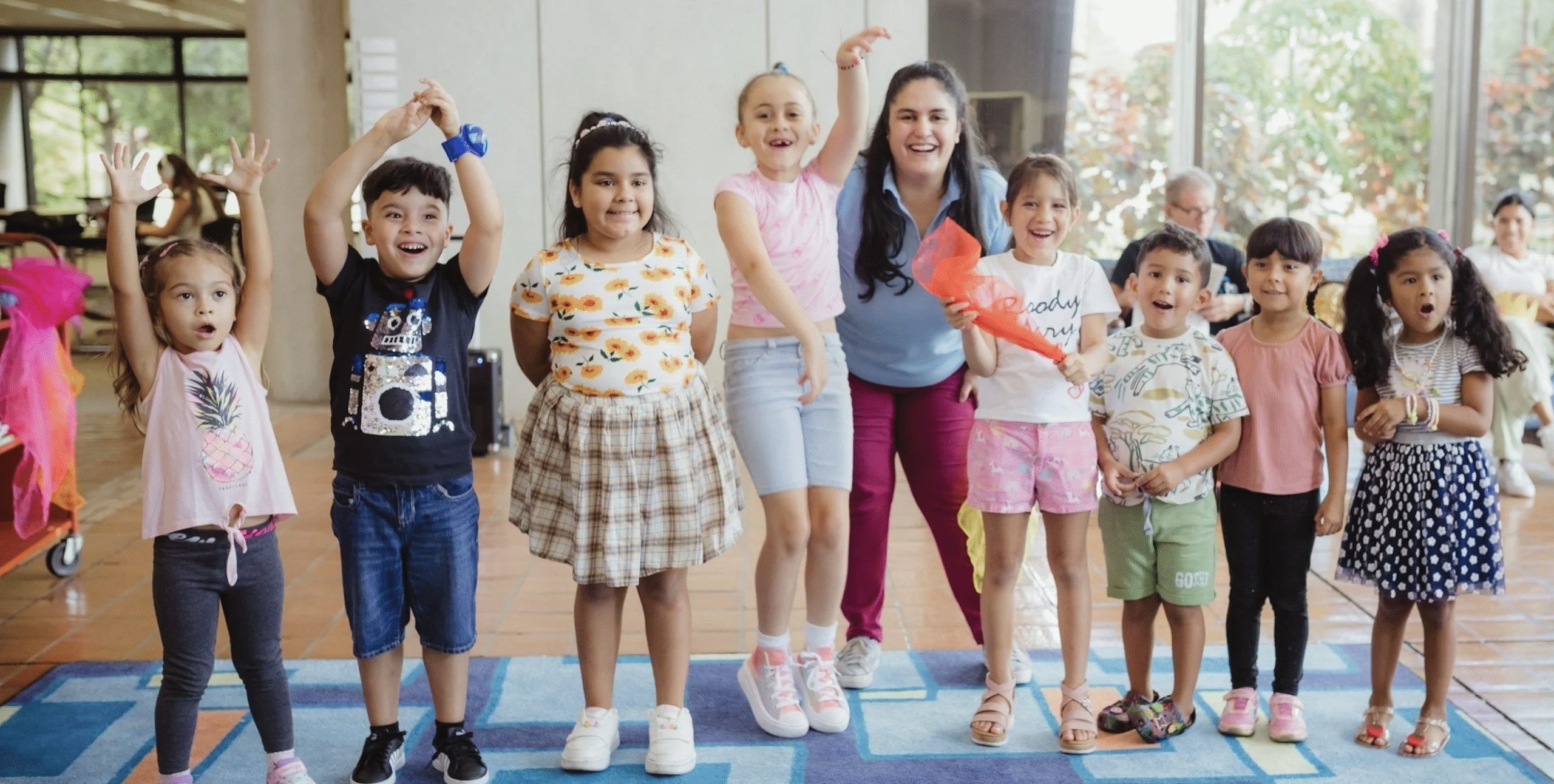 Teacher and students of The Lucy Project dyslexia reading program in a fun group photo.