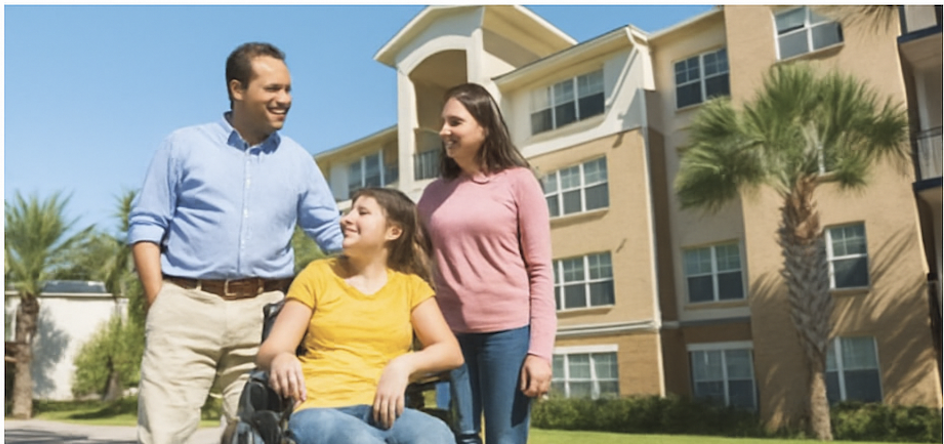 Smiling Latin American parents in Miami with daughter in wheelchair.