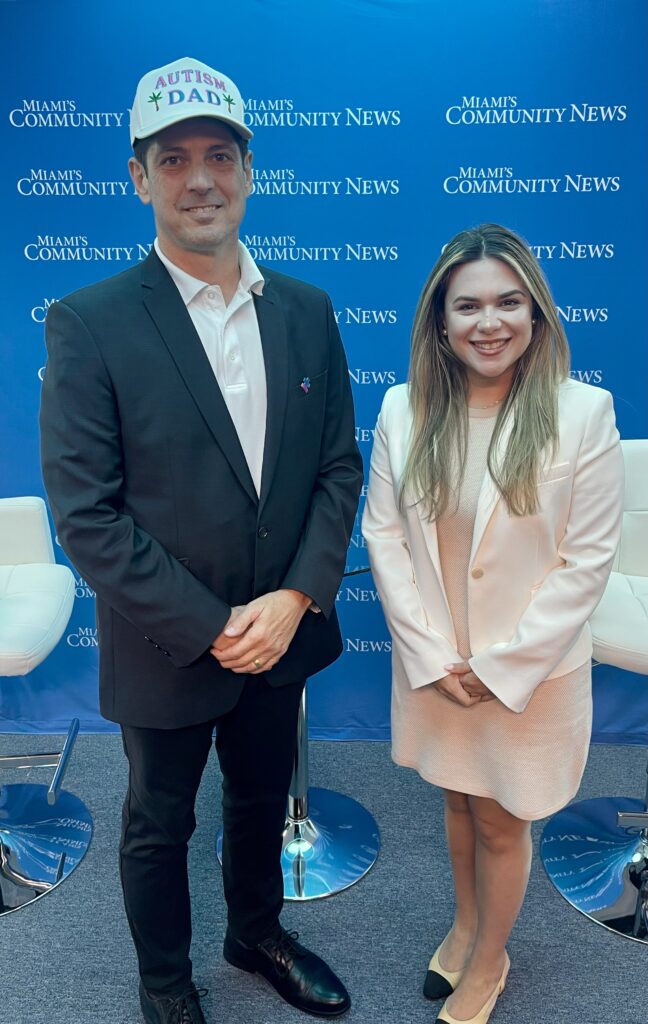 Miami Autism Dad Victor Antunez and Attorney Stephanie Cruz posing for a photo.