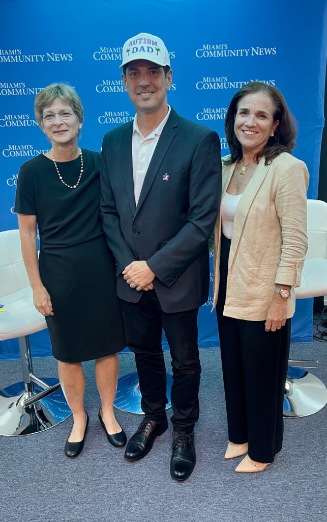 Vice Mayor Rhonda Anderson, HR Director Raquel Elejabarrieta, and Miami Autism Dad smiling for a photo.