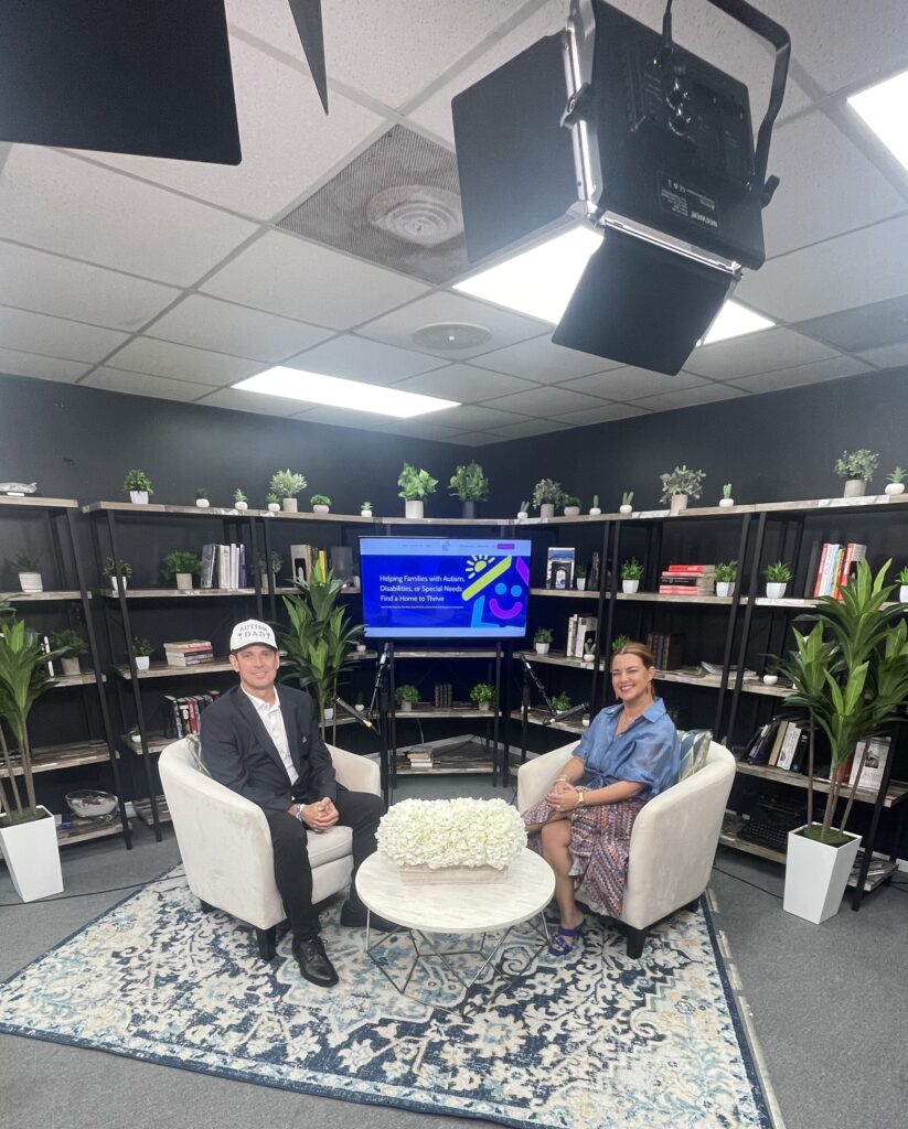 The Wonder Women Show host Yolanda Carvajal and Miami Autism Dad Victor Antunez smiling for a photo in the podcast studio..